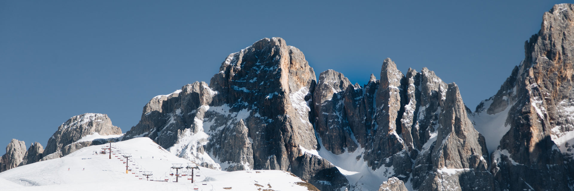 mountains-surrounding-a-ski-lift