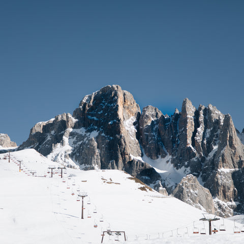 mountains-surrounding-a-ski-lift